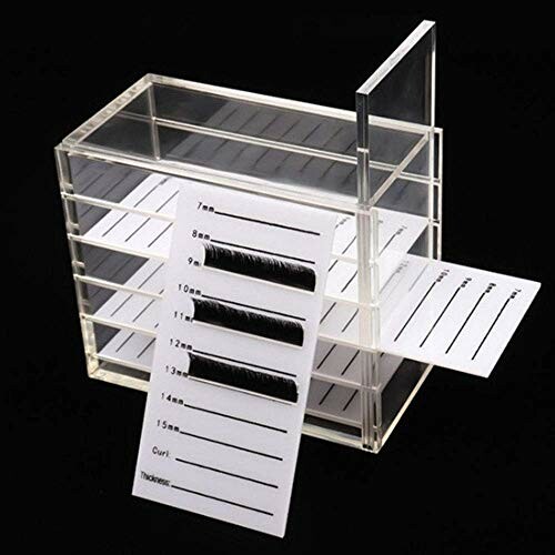 Acrylic eyelash extension storage box with labeled trays.