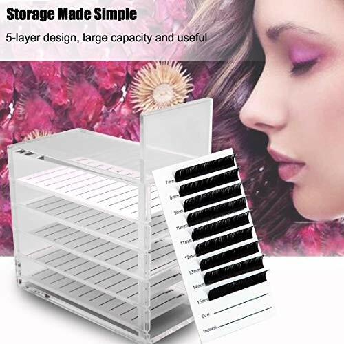 Eyelash storage organizer with multiple trays and a woman's profile.